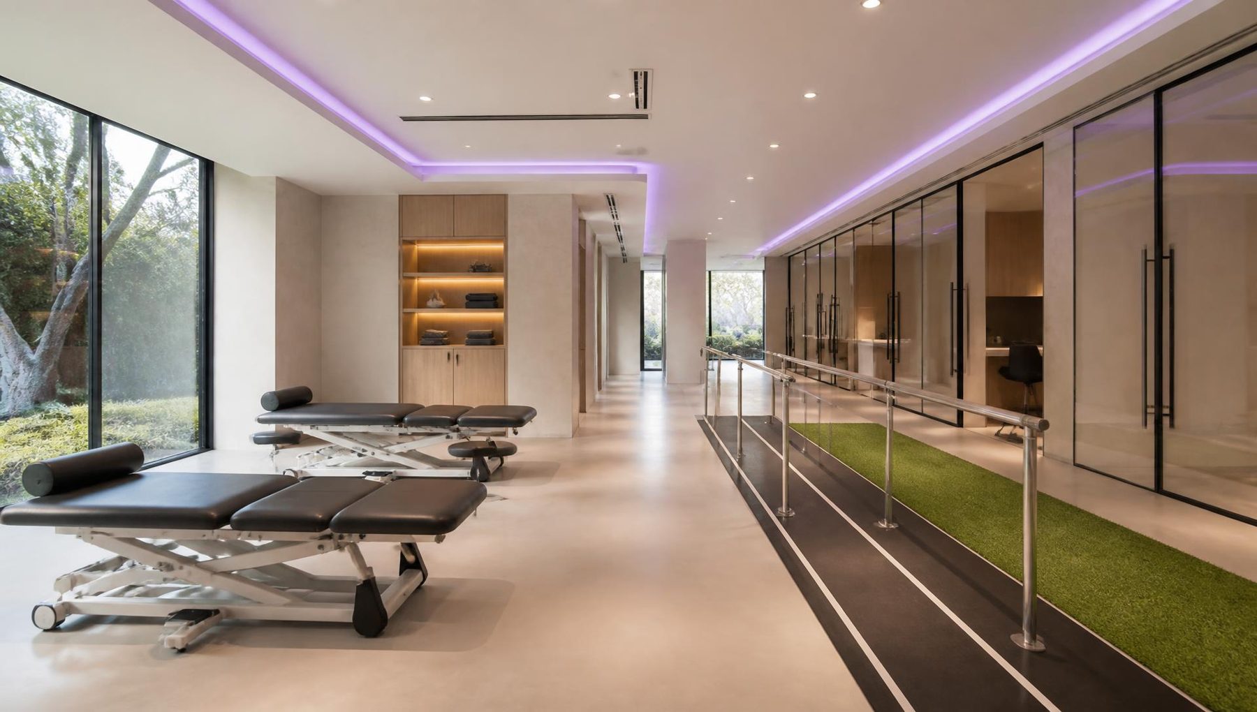 Illustrative view of the proposed physiotherapy and sports medicine suite with treatment plinths and a rehabilitation track