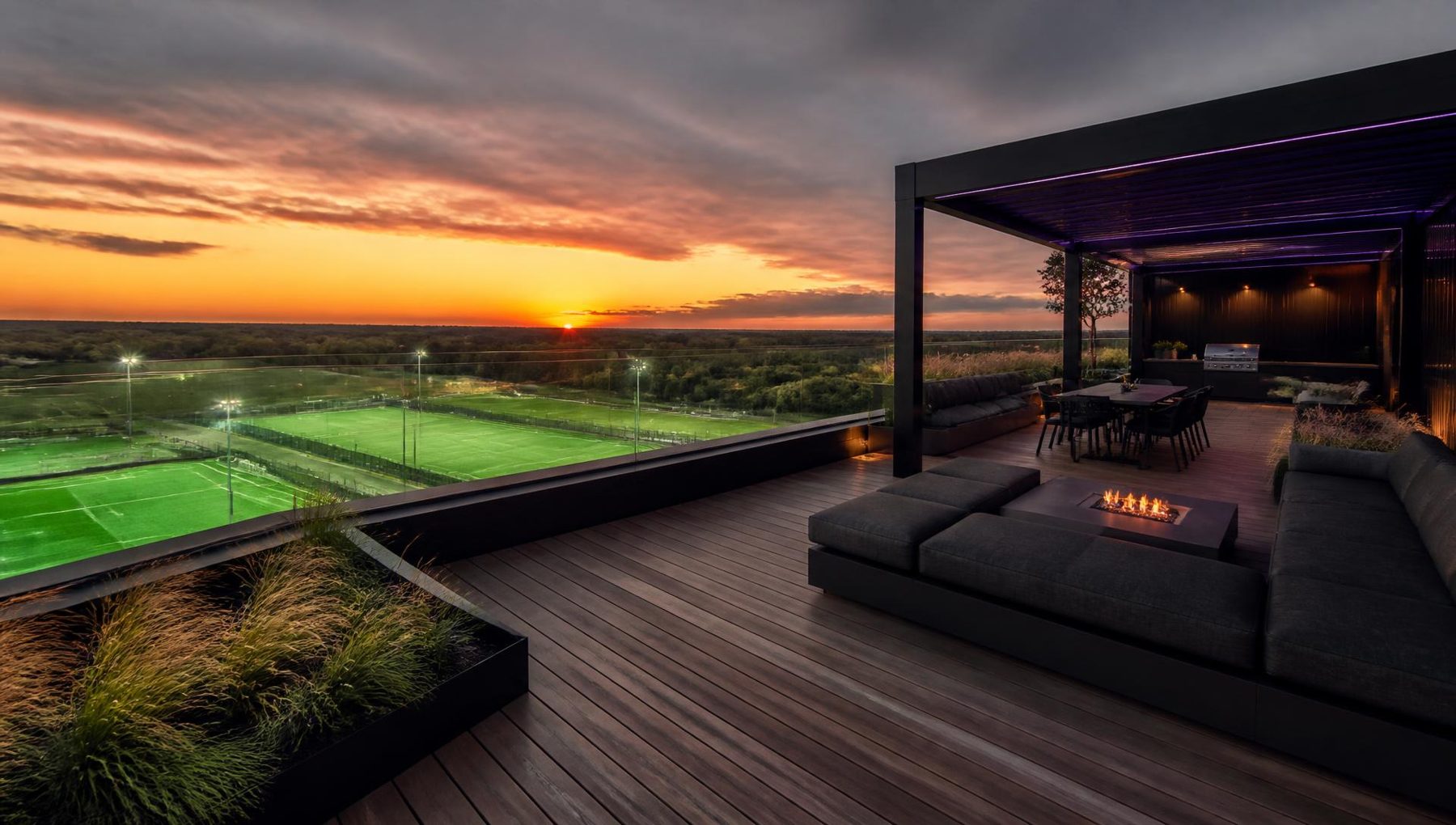 Illustrative render of the proposed rooftop terrace at dusk with outdoor seating, planting and views across the pitches